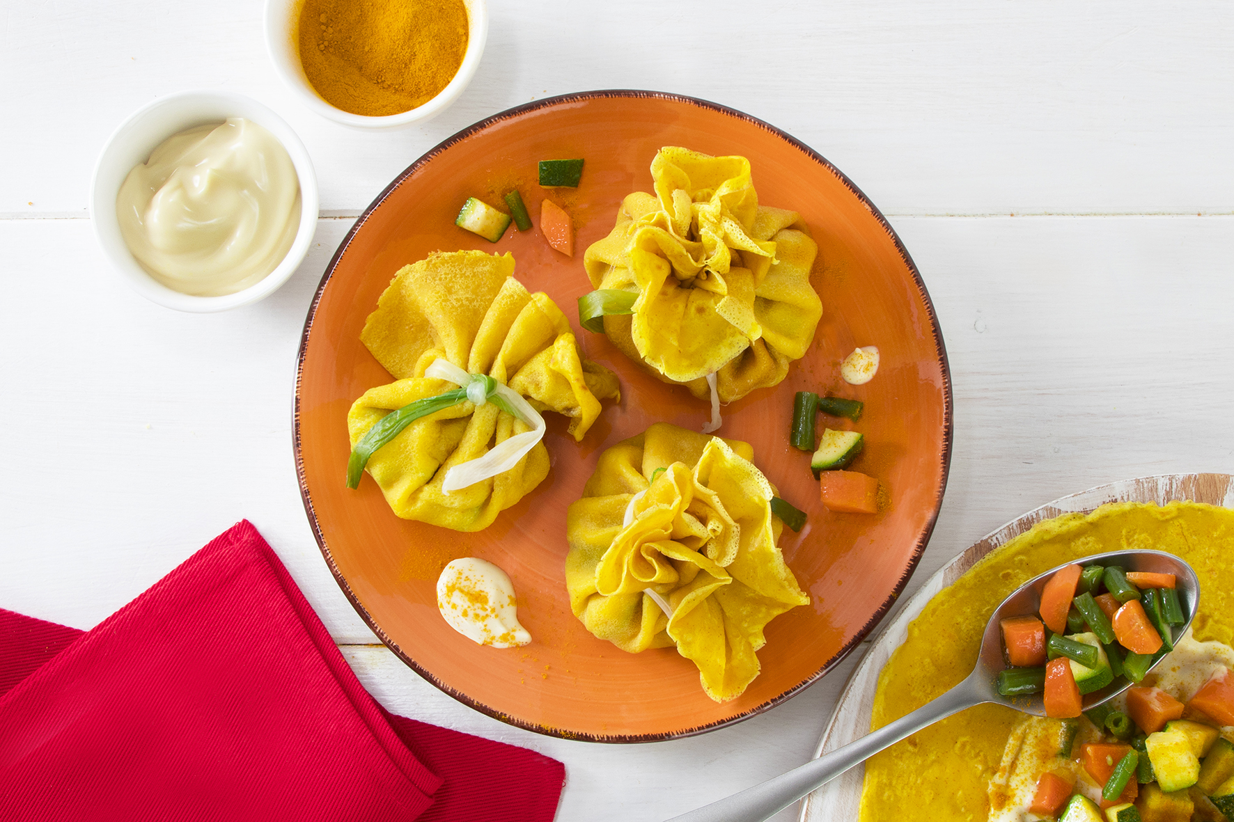 Fagottini alla curcuma ripieni di verdure senza uova